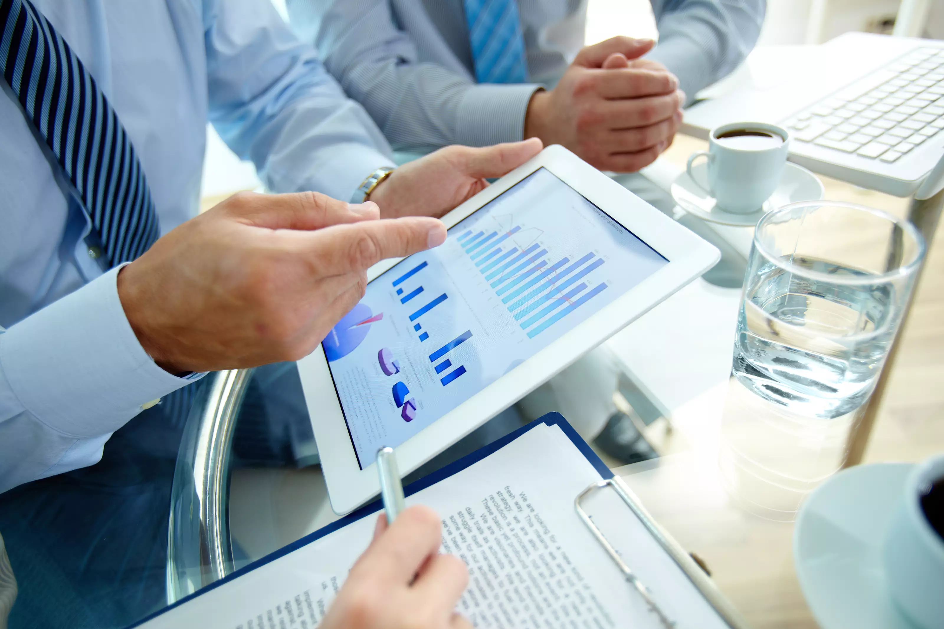 close-up-executive-pointing-graph_165