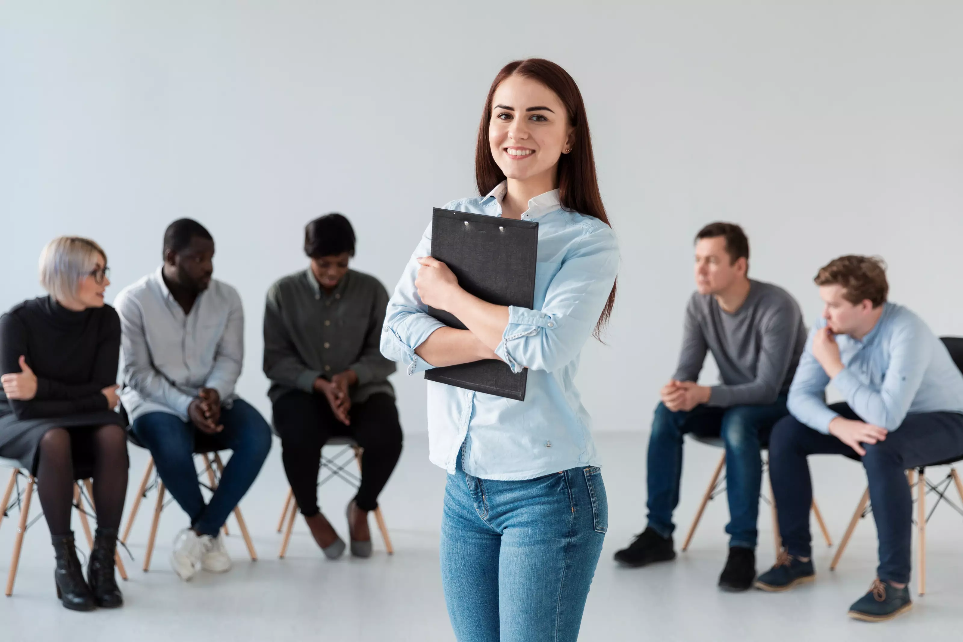 portrait-smiling-woman-holding-clipboard_162